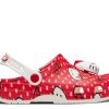 Zuecos clásicos Hello Kitty con lunares rojos