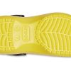 Zuecos Crocs (WMNS) X Smiley Classic con suela gruesa y cara sonriente, color amarillo y negro 207233-90H