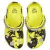 Zuecos Crocs x MCM con estampado de camuflaje «Amarillo neón» MEXCSMM27YN